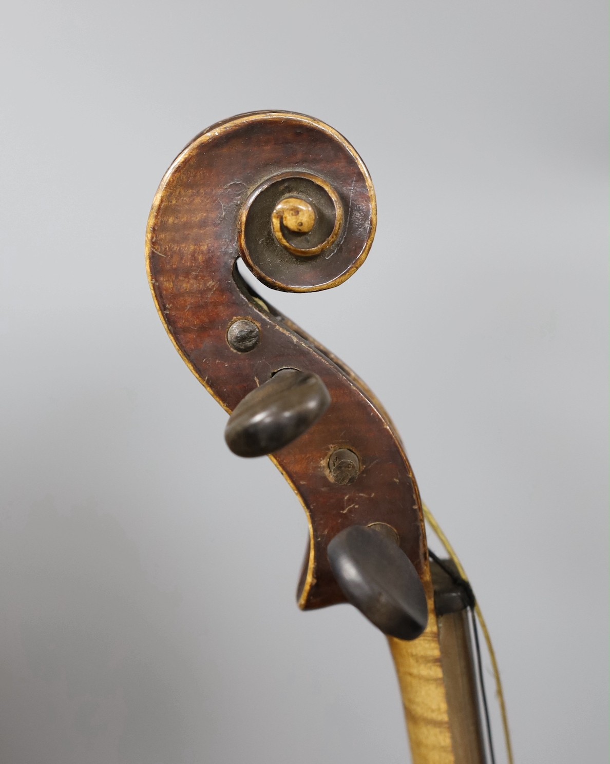 A cased German violin, labelled Stradivarius and dated 1886, back measures 36cm excl button